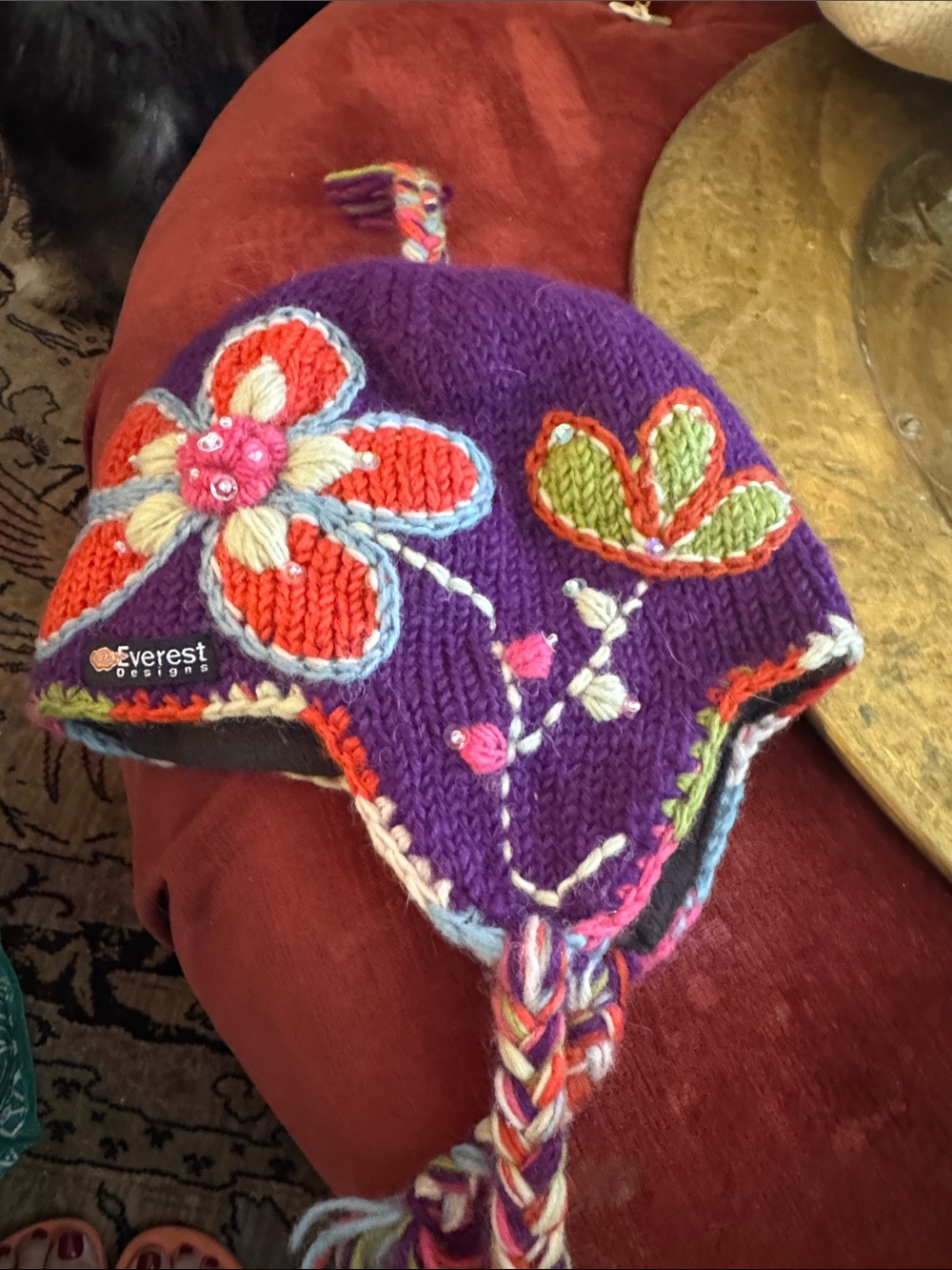 Everest Designs Purple Floral Knit Earflap Hat for Kids with Braided Tassels